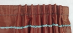 Záves ľahký-dekoračný hrdzavej farby s lankom v mertáži