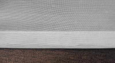 Biela metrážová, žakarová záclona s bielou bordúrou na spodku